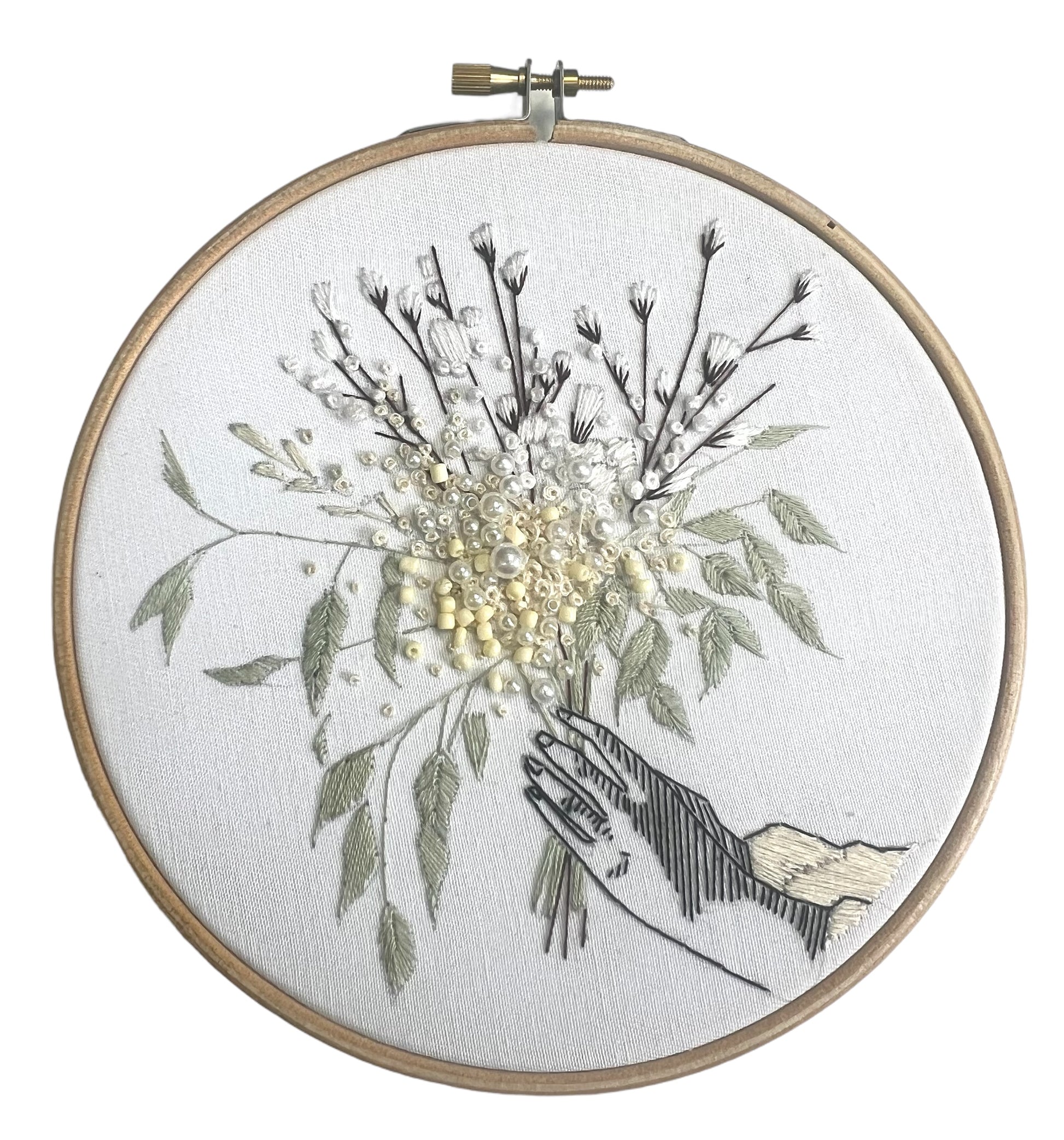 completed winter embroidery kit with hand detail