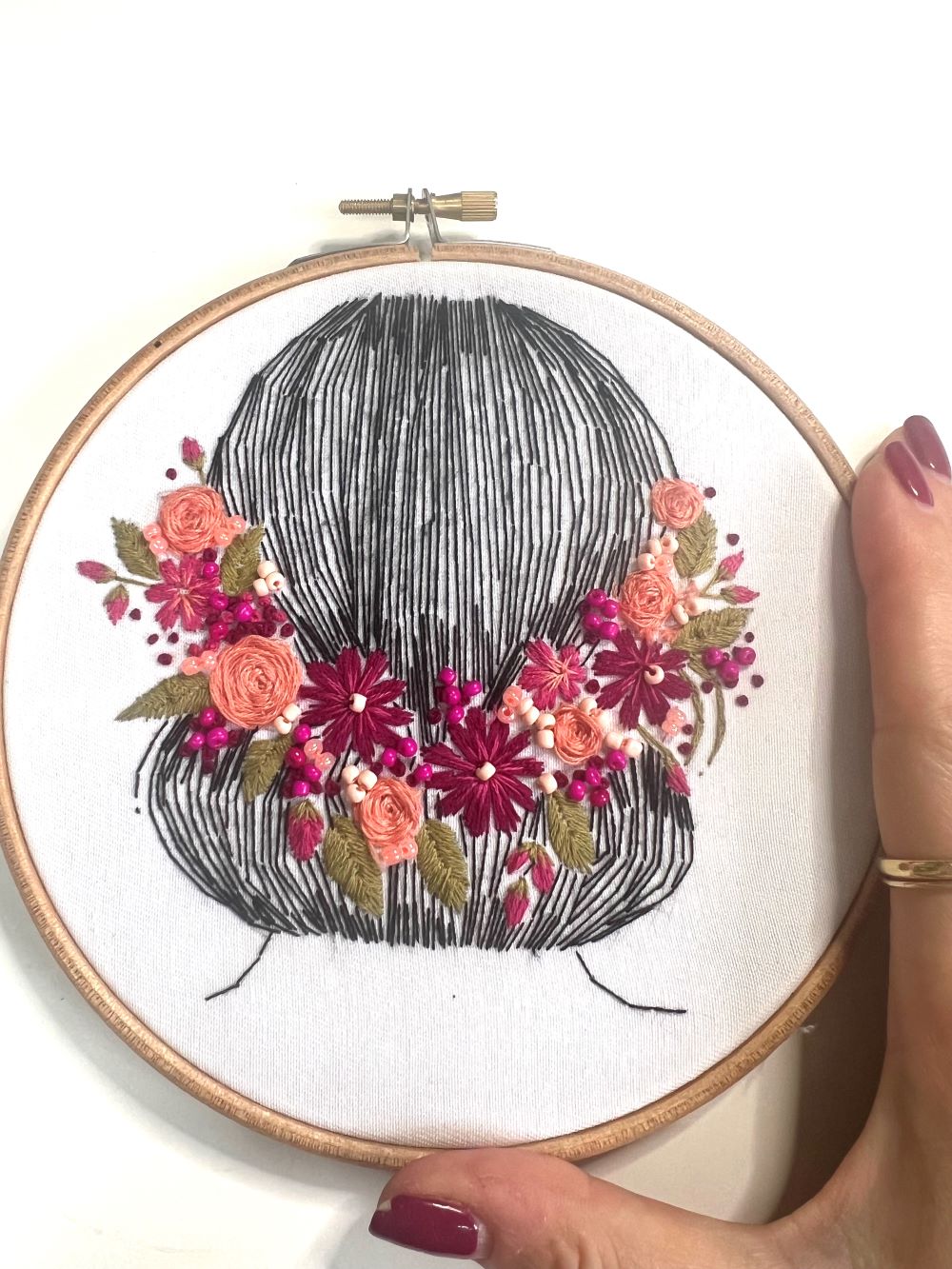 completed embroidery pattern in 6 inch hoop with hand details for scale beginner friendly embroidery kit including rose stitch, satin stitch, french knot and back stitch