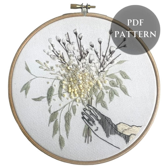 Winter floral embroidery pattern with bead and pearl detail 